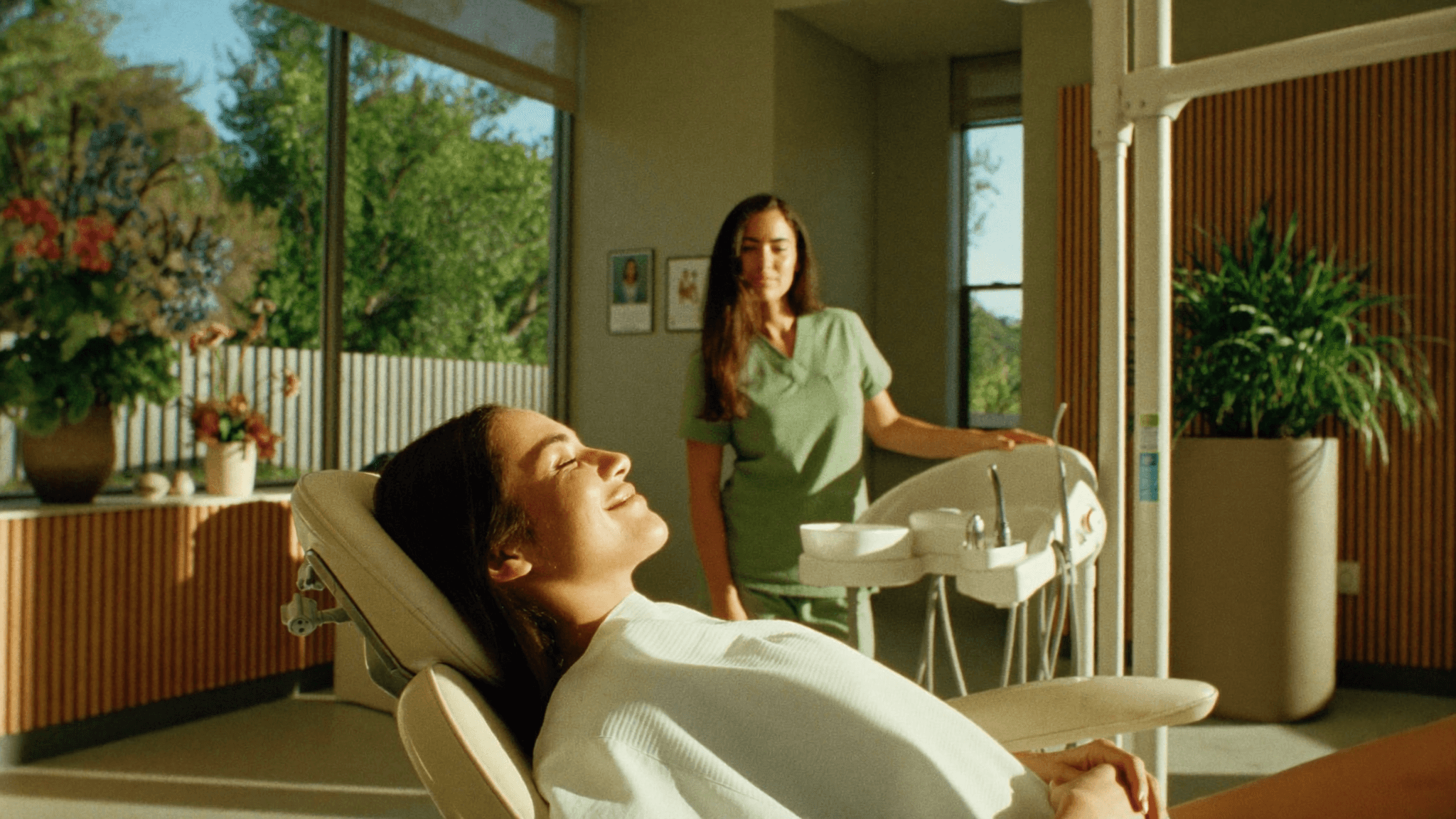 Relaxed patient in a dental chair bathed in golden afternoon light at Smiles4Life in Thousand Oaks, CA