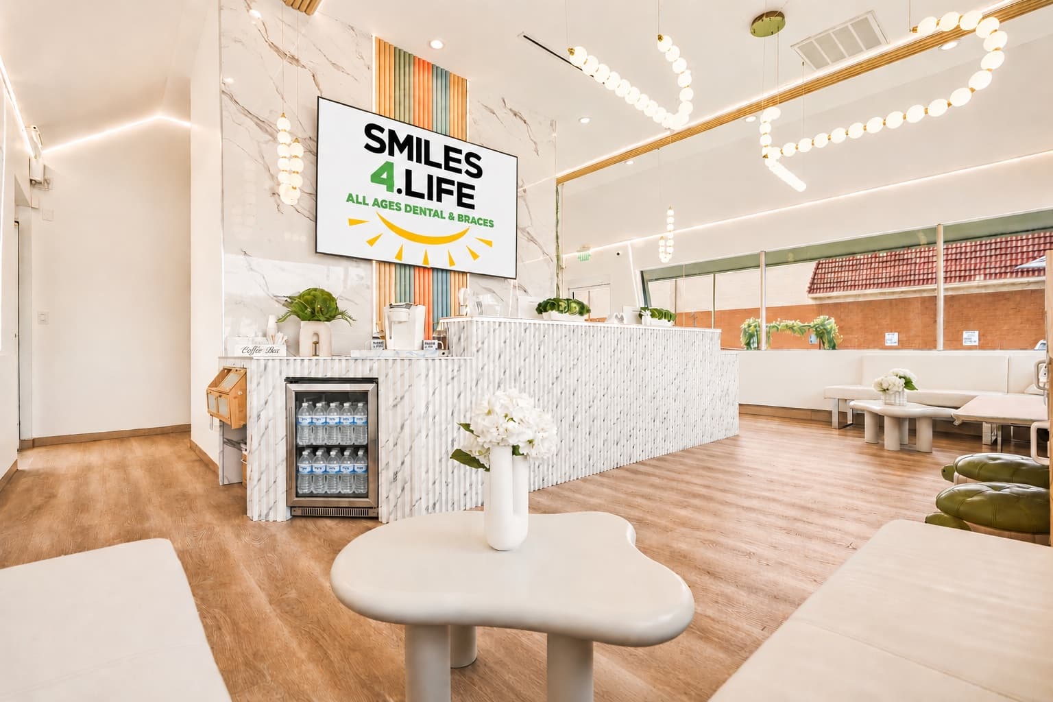 Smiles4Life waiting area with coffee bar beside the front desk in Thousand Oaks, CA